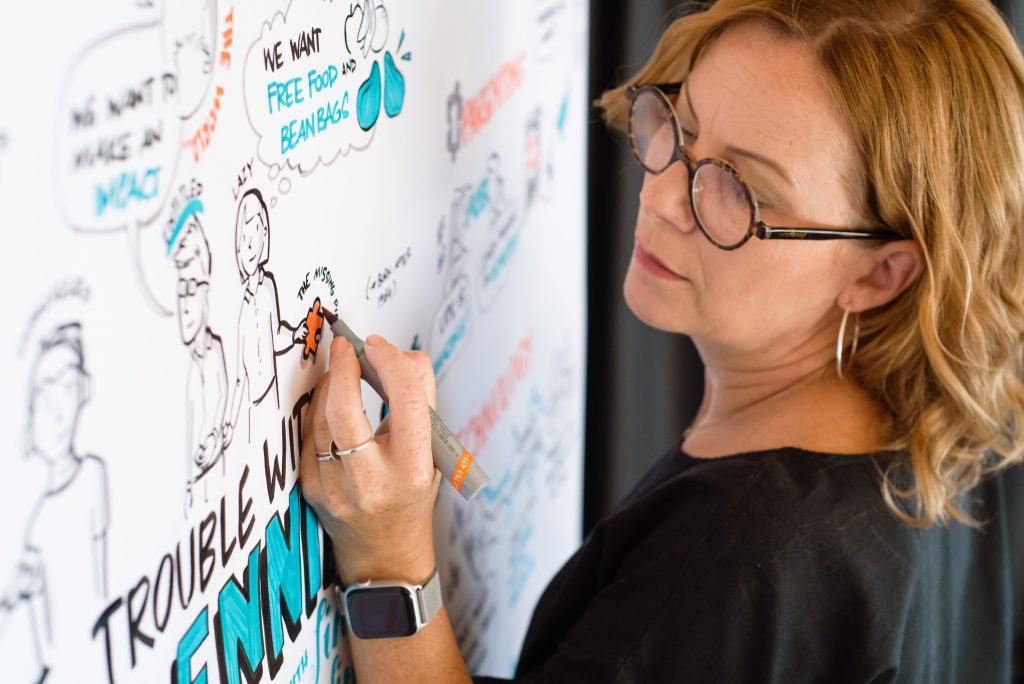 Debbie Wood – graphic recording analog style at the wall